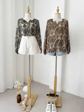 Tessia Longsleeves Printed Top